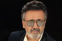 معین خواندن سرود تیم ملی فوتبال را تکذیب کرد